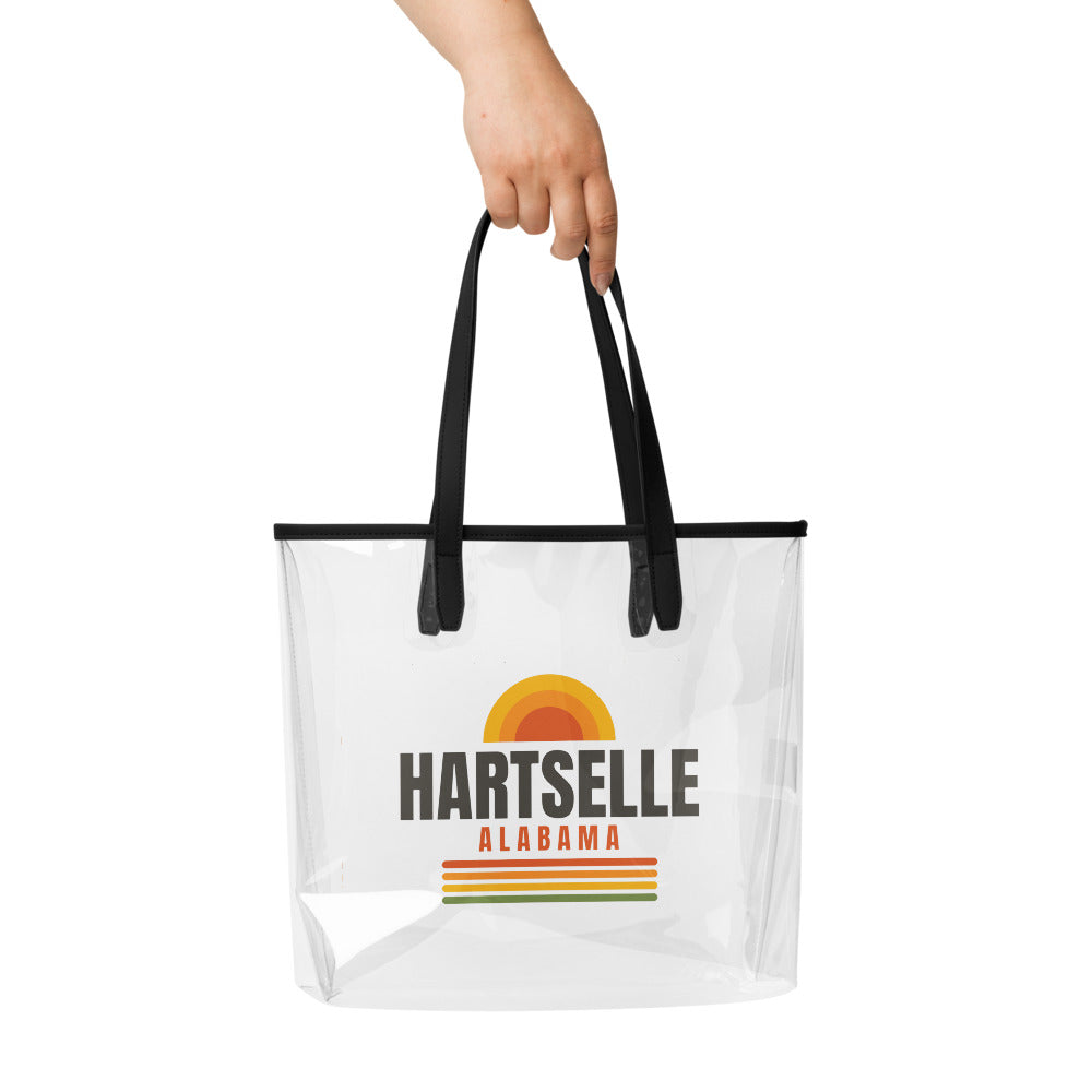 Hartselle Clear Stadium Bag — carried by hand, full HARTSELLE print visible